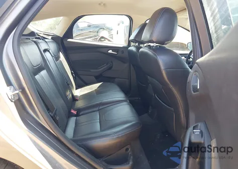 2014 Ford Focus Titanium z USA, uszkodzony, nr VIN 1FADP3N20EL257941